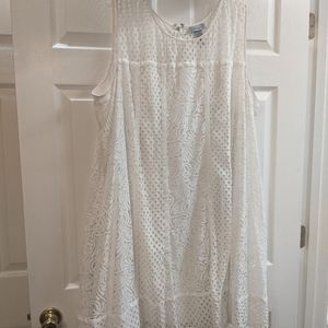 Catherine's sleeveless lace overlay dress.